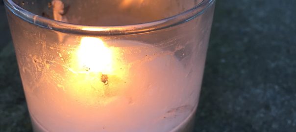 lit prayer candle